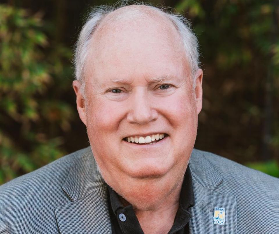close up of mostly bald man with sport coat